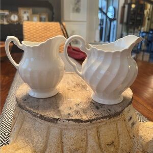 Set of vintage white creamers